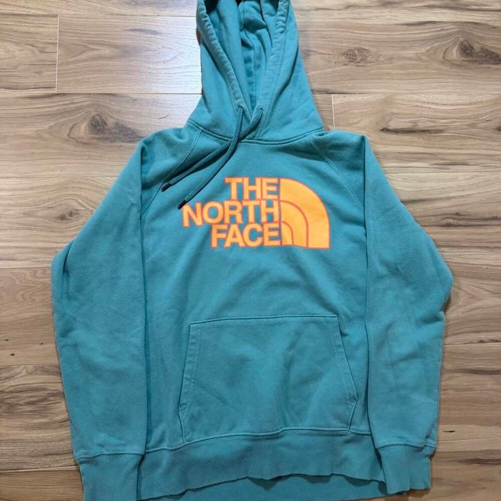 The North Face blue hoodie baggy fit graphic outdoors size women’s medium